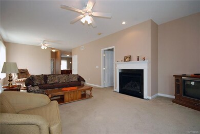 Living room, gas fireplace, door to master bedroom