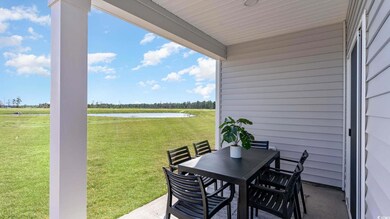 View of patio featuring a water view