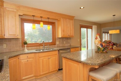 Beautiful cabinets, solid surface countertops and 