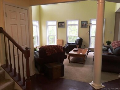 The open foyer welcomes you to this home.