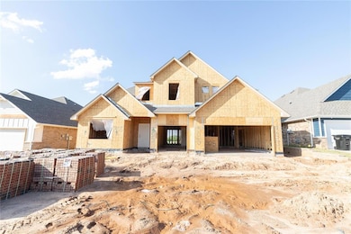 Property under construction featuring a garage