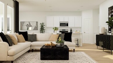 Living area with light wood-style floors