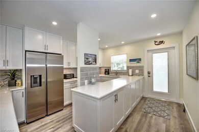 Kitchen with light countertops, stainless steel fr