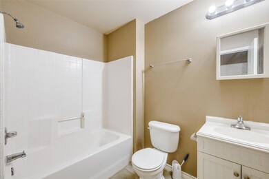 Full bathroom with shower / tub combination, vanit