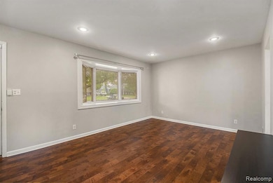 Living Room, you'll love the natural light from the front window!