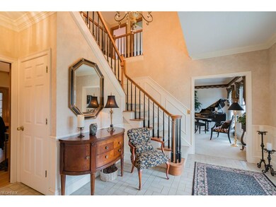 Wide entryways lead to Formal Dining Room and Livi