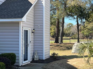 View of property exterior with a shingled roof and