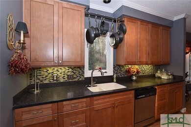 Updated kitchen cabinets with granite counter tops
