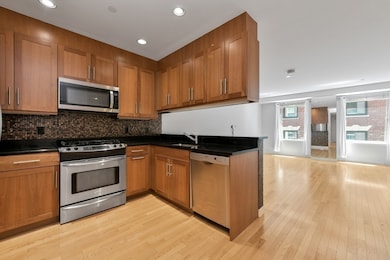 Folio Boston unit 603, Boston, MA 02110 - photo 3