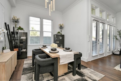 Dining room is open to kitchen and living.