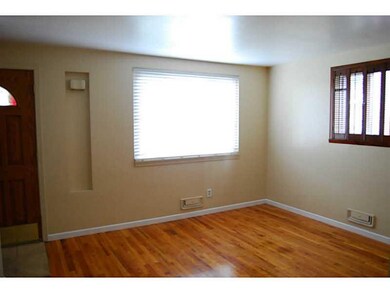 Living Room. Beautifully redone hardwood floors