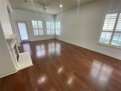 Unfurnished living room with a ceiling fan, plent