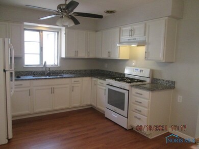 Kitchen with White Cabinets and Granite CT