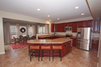 View of the kitchen and morning room. There is so 