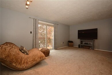 Living Room with newer sliding glass door leading 