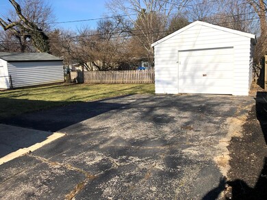Long Driveway with Detached Garage.