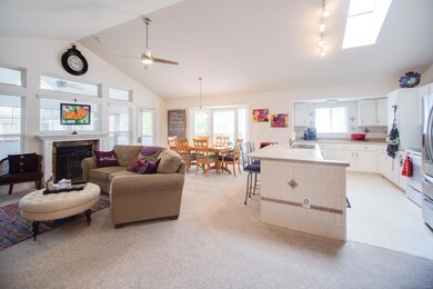 view of open floor plan and breakfast bar