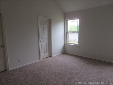 Master bedroom has new carpet and fresh paint.