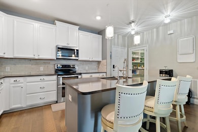 Kitchen featuring stainless steel appliances, visi
