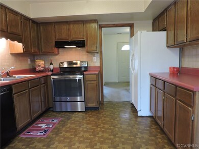 Kitchen view to foyer.