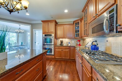 Double ovens and professional gas cooktop round out the chefs perfect amenities