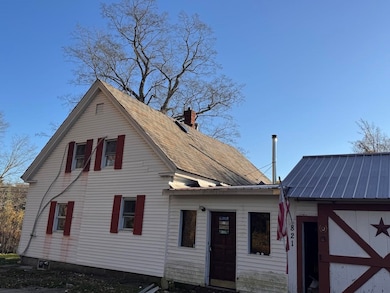 Side Entry Between House and Three Bay Storage