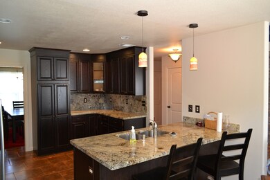 Striking cabinets and granite counters!