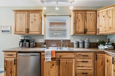 A window over the sink let's in that amazing natural light!