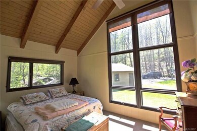 bedroom 1 light and airy; detached garage in dista