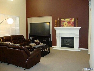 Family Room has Media Niche and Fireplace
