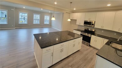 Kitchen w/ Deluxe Island and Granite countertops