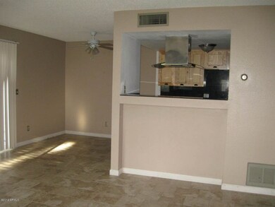 Open kitchen, dining room. Tile flooring