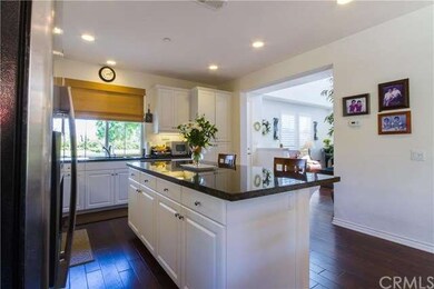 The center island in the kitchen has lots of cabin