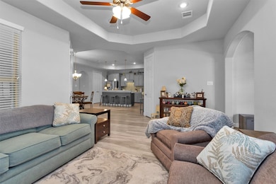 Living room is open to the kitchen and dining room