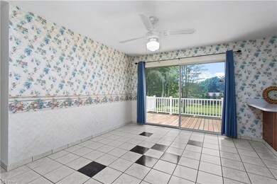 Dinning area with ceiling fan and tile floors