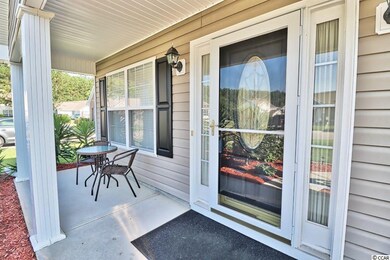 This porch is ready for your front porch Sitting!!