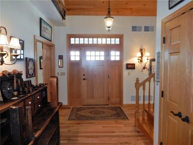 Cheery Entry hall reflects the friendly spirit of 