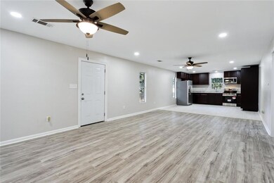 Open living, dining, and kitchen