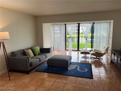 Living room featuring tile patterned flooring