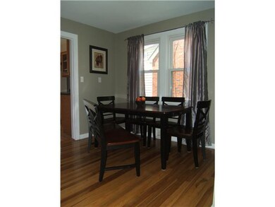 Dining Room NEWER WINDOWS AND REDONE HARDWOOD FLOO