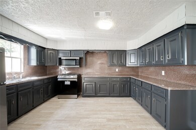 7318 Dahlia St unit C, Houston, TX 77012 - photo 6