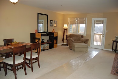 View of Dining and Walk-Out to Deck