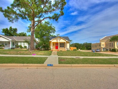 View of front of house with a front yard