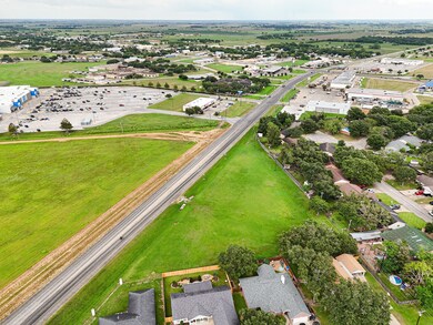1.6 acre lot off West Loop (FM 2765)