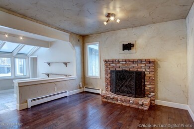 Family room with wood burning fireplace
