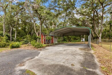 asphalt driveway to carport