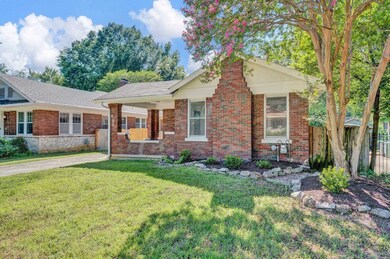 Single story home featuring a front lawn