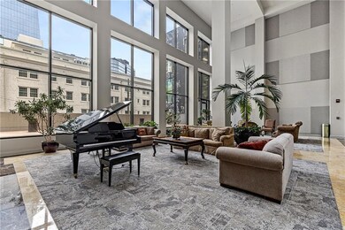 Community lobby featuring a towering ceiling