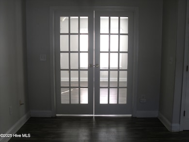 124 Pella Lane French doors to bonus roo