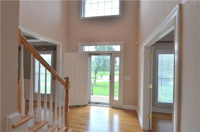 You'll love the sunny 2-story entry foyer. The har
